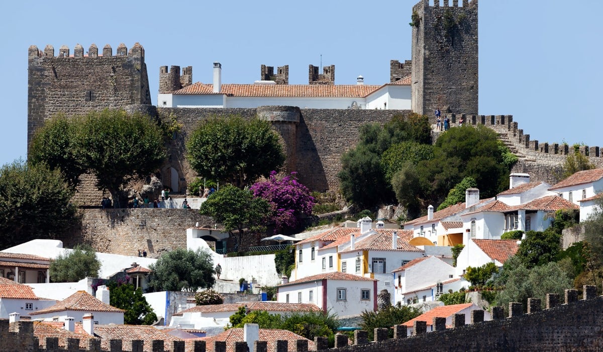 Historic Stops Between Lisbon and Porto: Obidos, Nazare, Batalha, Tomar and Coimbra